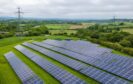 Electricity pylons alongside solar panels at a solar farm near Chesterfield, UK, on Monday, May 20, 2024.