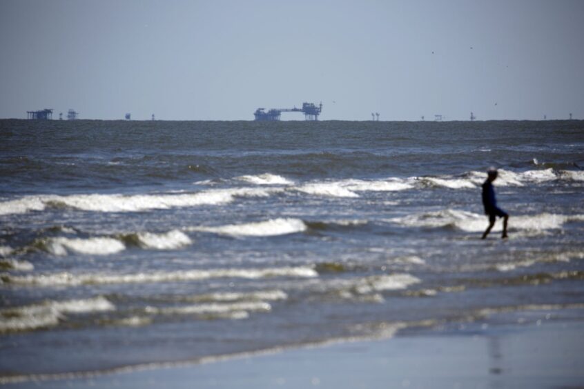 Offshore platforms operate off the coast of Grand Isle, Louisiana, US. Photographer: Luke Sharrett/Bloomberg