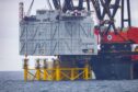 A topside being installed at RWE's Sofia offshore wind farm.