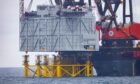 A topside being installed at RWE's Sofia offshore wind farm.