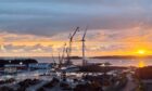 Five Hywind Scotland turbines in Port of Wergeland, Norway.