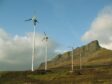 Community-owned wind turbines on the island of Eigg in Scotland.