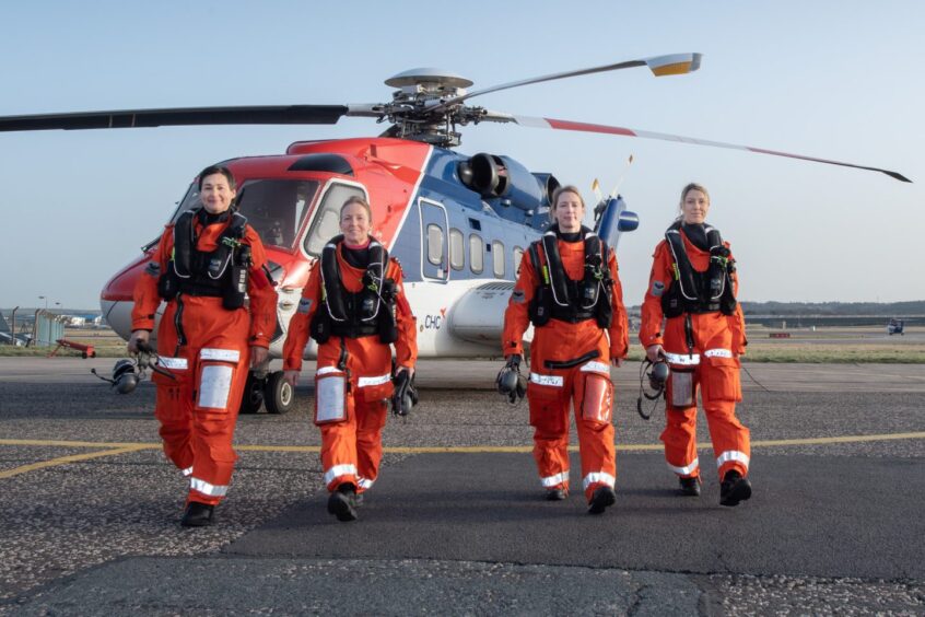 An all-female group of workers from Equinor, Aker Solutions and OEUK being flown out by CHC.