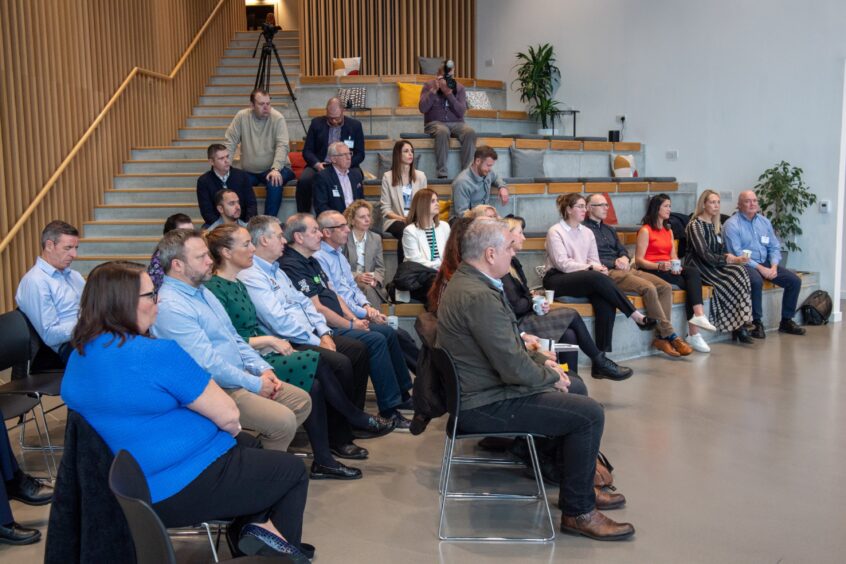 People sitting on seats at One Biohub in Aberdeen,