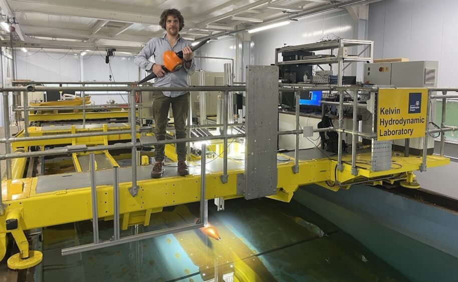 George Dadd, HydroWing lead turbine engineer, at hydrodynamic testing lab.