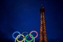 General view of the Olympic Rings and the Eiffel Tower.