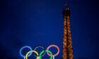 General view of the Olympic Rings and the Eiffel Tower.