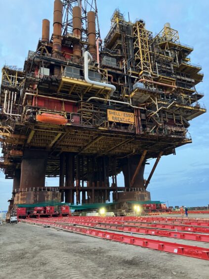 The Brent Charlie topside is positioned into place at the Able Seaton Port near Hartlepool for decommissioning.