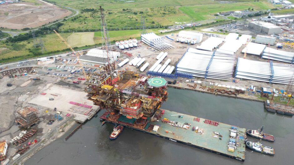 The Brent Charlie topside is positioned into place at the Able Seaton Port near Hartlepool for decommissioning.