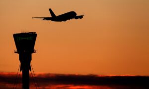 File photo dated 19/01/16 of a plane at sunset over Heathrow Airport in London. Image: Steve Parsons/PA Wire