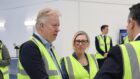 Scotland's acting Cabinet Secretary for Net Zero and Energy Gillian Martin MSP (centre) and Hydrasun hydrogen director Dr Stuart Mitchell (left) during a visit to Hydrasun offices near Glasgow.