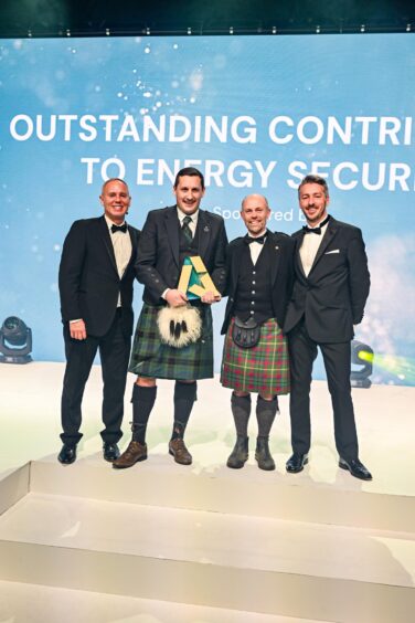 L to R: Rob Rinder, Jamie Dempster and Roger McMichael from OceanWinds, with Martin Scargill from award sponsor Centrica Energy Storage.. Aberdeen. Supplied by Michal Wachucik, Aberdmedia Date; 28/11/2024