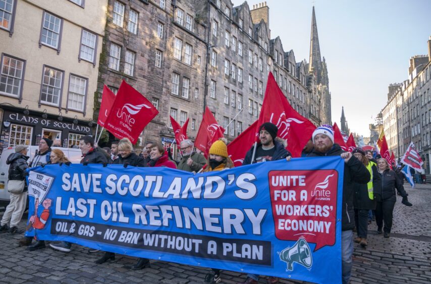 Members of the Unite union march and rally at the Scottish Parliament in protest at Petroineos plans to close Grangemouth oil refinery. Image: Jane Barlow/PA Wire