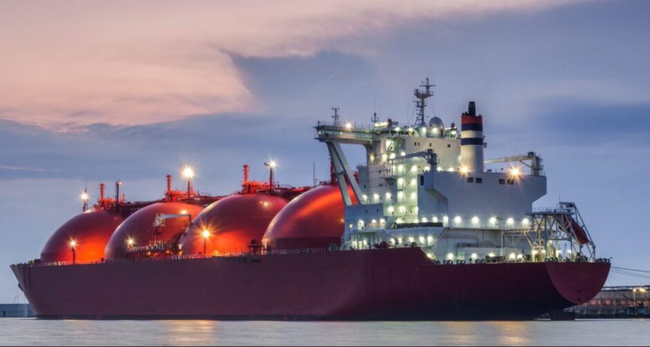 LNG TANKER - Ship at dawn moored to the gas terminal.