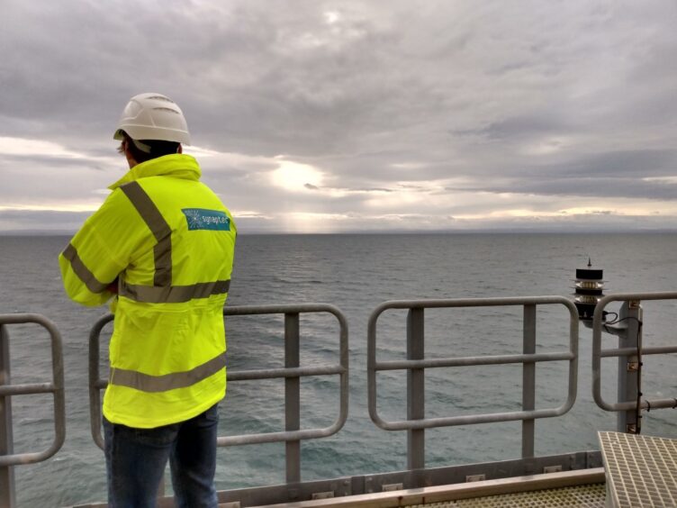 A Synaptec technician working offshore.