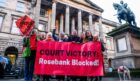 Climate campaigners celebrate outside the Court of Session in Edinburgh following a ruling overturning the approval of Equinor's Rosebank oil development in the North Sea. Image: Stop Rosebank