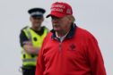 File photo dated 03/05/23 of US President elect Donald Trump playing golf at his Trump Turnberry course in South Ayrshire during his visit to the UK. Image: Andrew Milligan/PA Wire