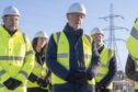 First Minister John Swinney during a visit to the Coalburn 1 battery energy storage site in Lanark, South Lanarkshire. Image: Jane Barlow/PA Wire