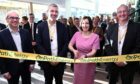 Bridget Phillipson MP cutting the ribbon at OnPath Energy's Chase House headquarters in Sunderland, with (from left) OnPath Energy chief financial officer Simon Fisher, Simon Maine of Brookfield Asset Management and OnPath Energy CEO Richard Dunkley.