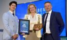 Camilla Carlbom Flinn is presented with the Humber Renewables Champion award in 2024, by Humber Marine & Renewables chair Iain Butterworth, right, joined by host Ben Hanlin.