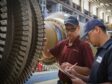 EthosEnergy workers with a gas turbine.