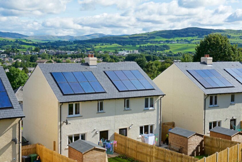 Solar panels on rooftops of new housing in Cumbria. Cumbria. Supplied by CPRE.