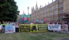 Picture shows; Greenpeace protest. Westminster. Supplied by Greenpeace Date; 14/05/2025
