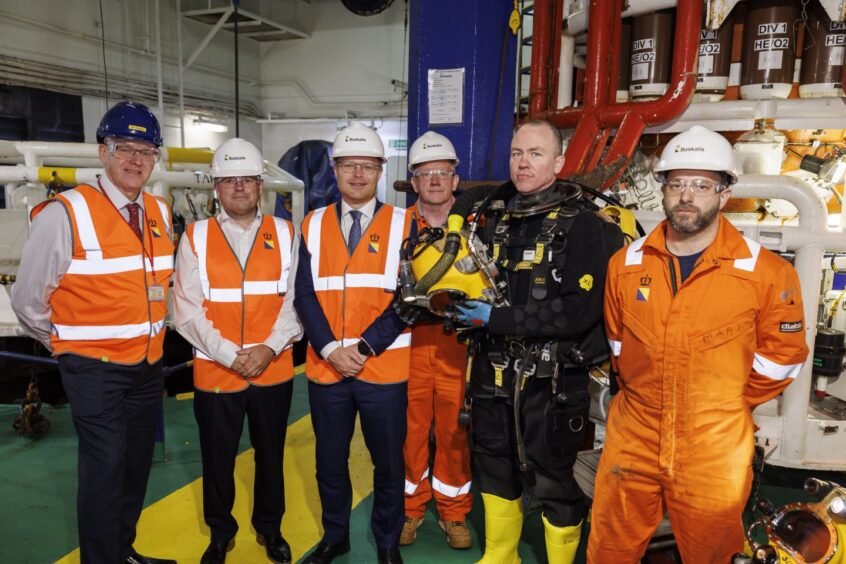 Members of Boskalis Subsea Services with energy minister Michael Shanks.