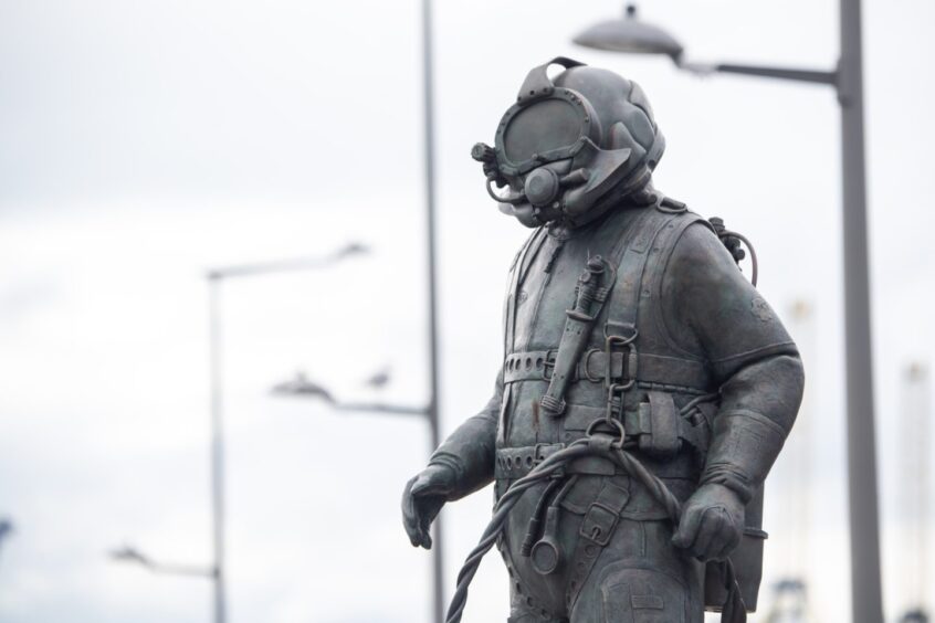 The new memorial statue for North Sea divers that was unveiled in Pocra Quay, Fittie. Image: Kami Thomson/DC Thomson