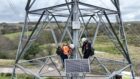 Technicians upgrading National Grid power lines.