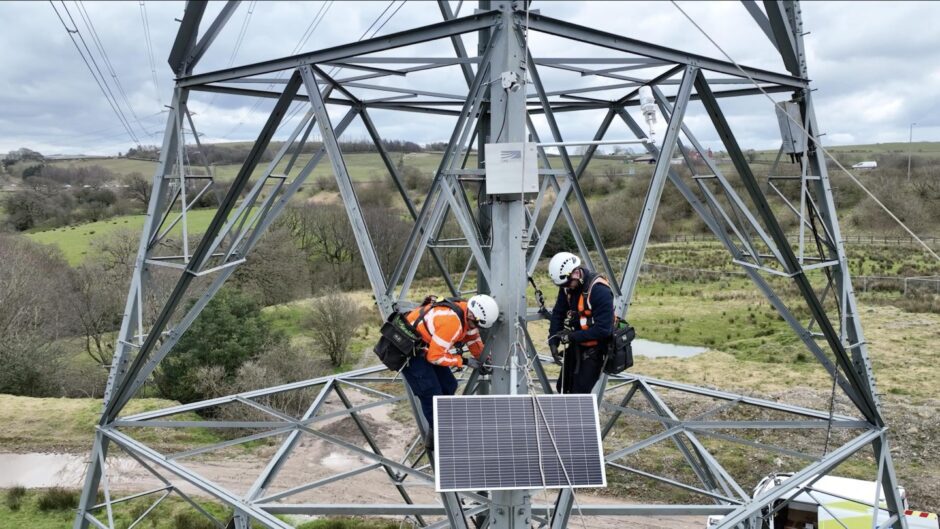 Technicians upgrading National Grid power lines.