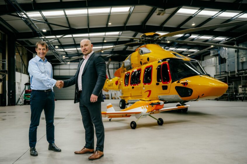 Charles Tavner (L) and Jamie John (R) pictured at the NHV hangar in Aberdeen.