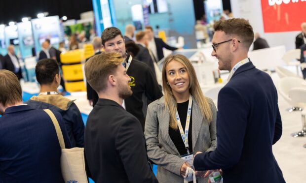 Attendees chat at Offshore Europe