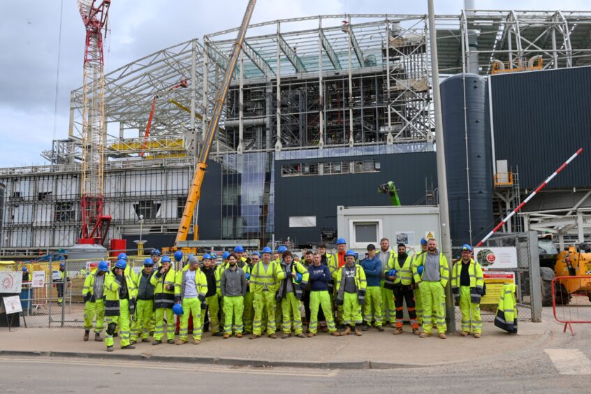 Dozens of workers have walked out on the project to build Aberdeens energy from waste incinerator, The Ness, in a row over unpaid wages.
