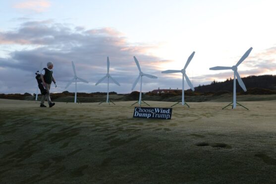 Greenpeace activists target Trump golf course in Scotland