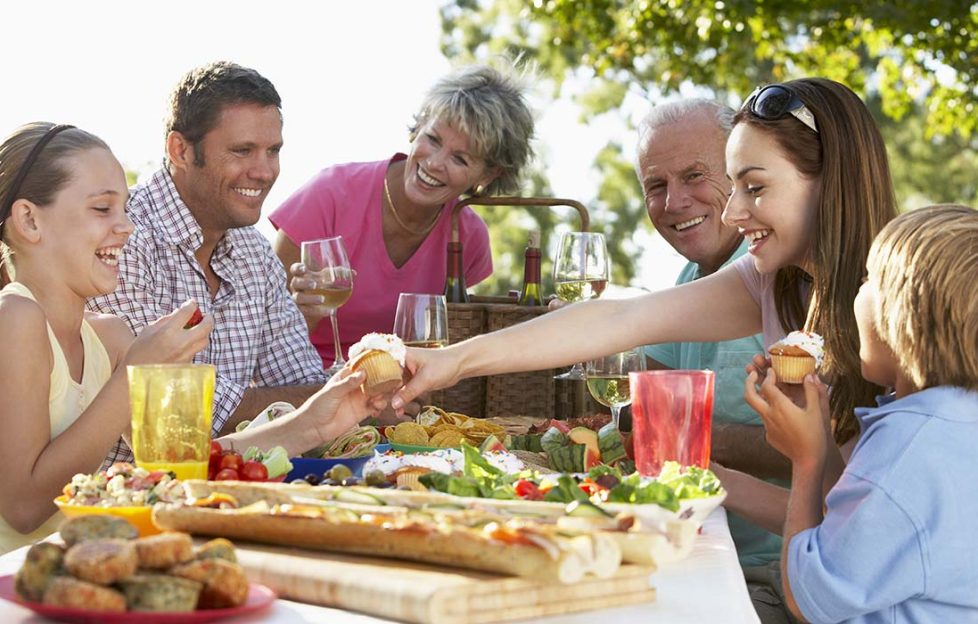 A family enjoying a picnic, things to do on a sunny day