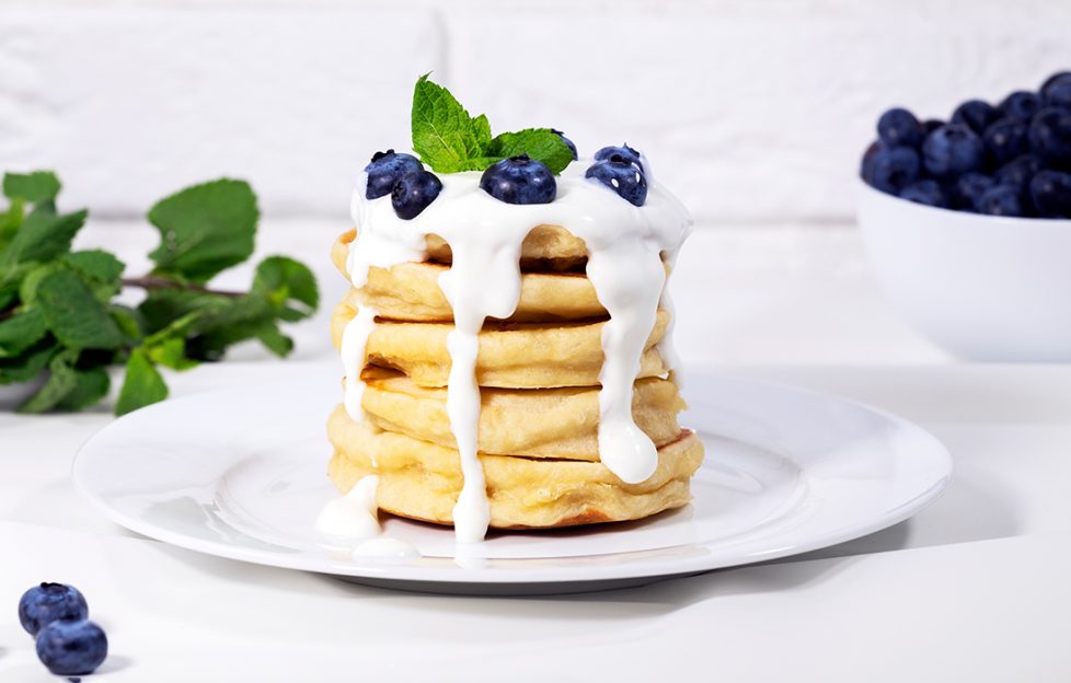 American pancakes with blueberries and yoghurt