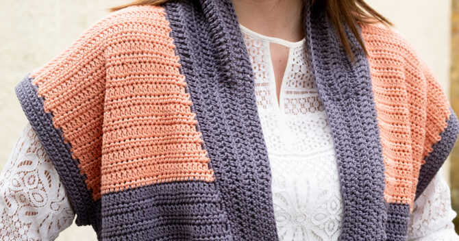 Close up of crochet gilet shoulders two-tone fabric