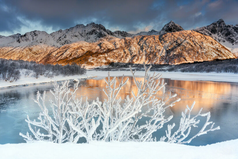 ‘Frozen’. A crisp wintery view of a lake surrounded by mountains. Captured by Giovanni Azzi, taken in Hopen, Norway. Provided by The CEWE Photo Award.