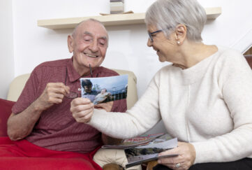 Elderly couple sharing memories living with dementia
