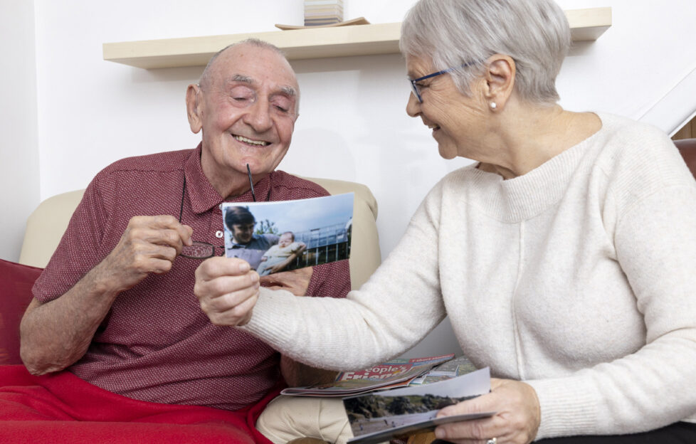 Elderly couple sharing memories living with dementia