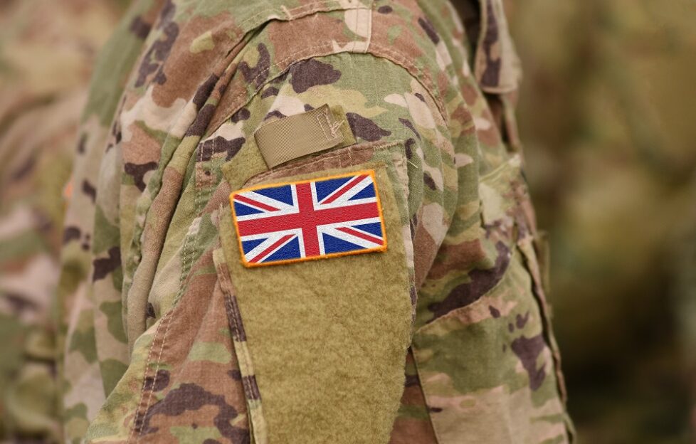 armed forces day: union jack patch on sleeve of army uniform
