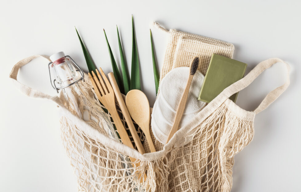 Easy eco swaps for the bathroom, bamboo products in a fabric bag