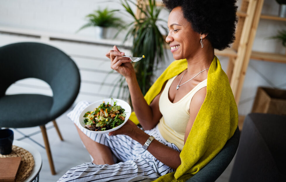 Woman eating healthy salad