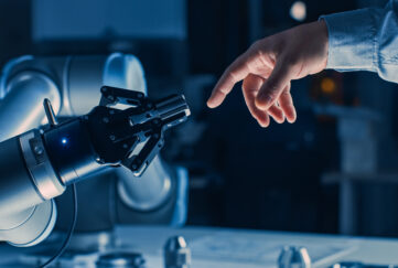 Robot hand reaching for human hand