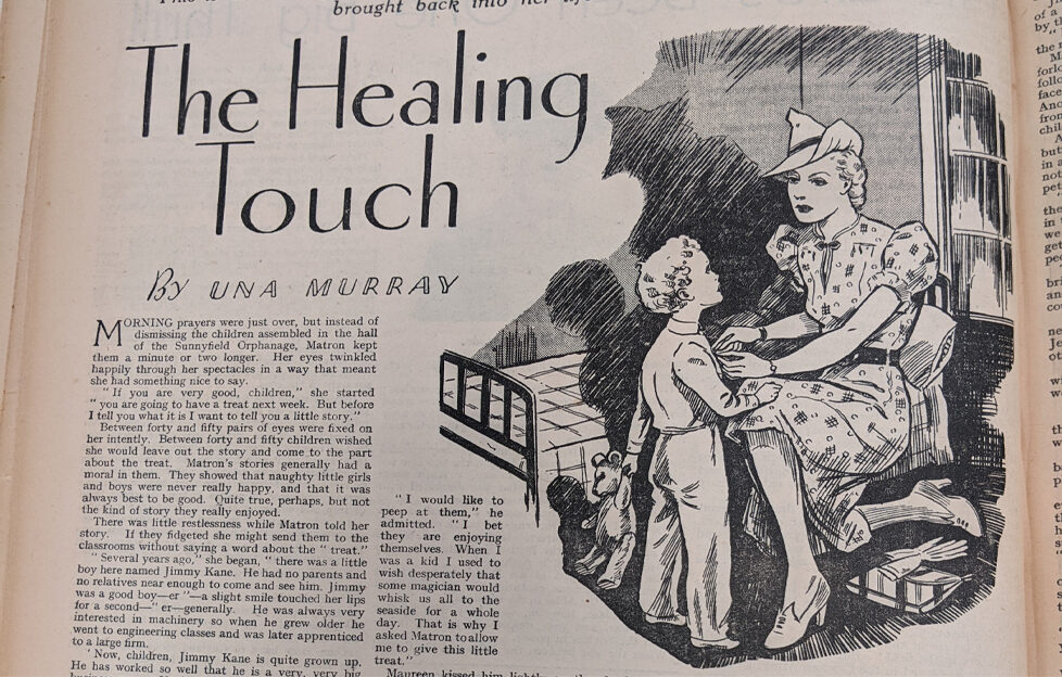 A photo of the original print of "The Healing Touch" from "The People's Friend" archives, published January 1940. Featuring the title and illustration of woman putting a child into pyjamas ready for bed.