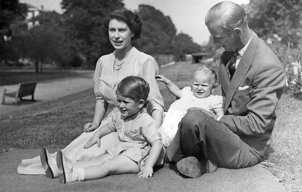 1952 black and white photograph of Princess Elizabeth with husband Prince Philip and two children Prince Charles and Princess Anne