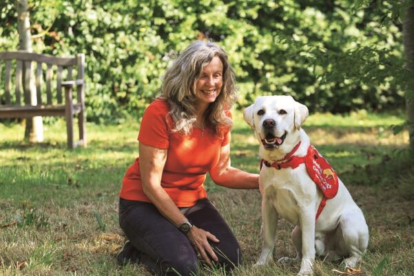 Jackie with bio-detection dog in training Chip.