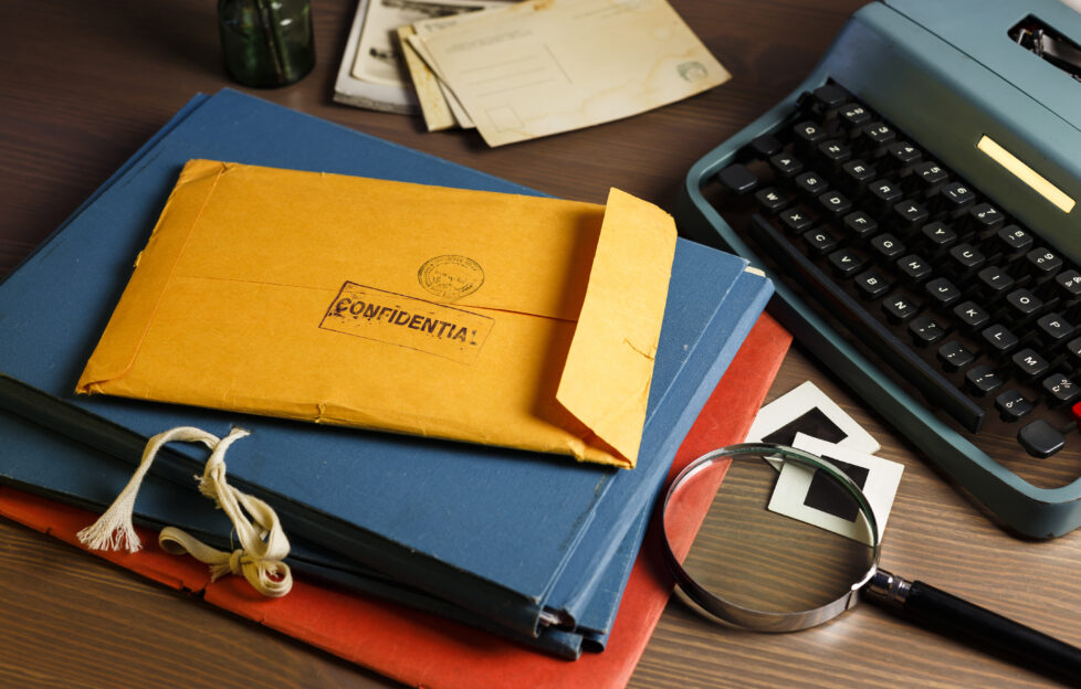 Desk with letters and files and typewriter