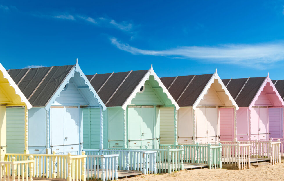 Fiction story starter: Summer. A row of beach huts